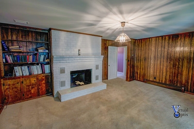 1497 Tinkling Spring Road Staunton, VA 24401 - Photo 12 of 31 a view of a livingroom with furniture and a fireplace