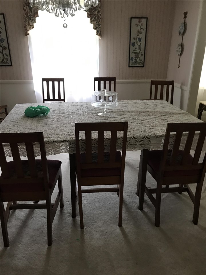 1497 Tinkling Spring Road Staunton, VA 24401 - Photo 14 of 31 a view of a dining room with furniture