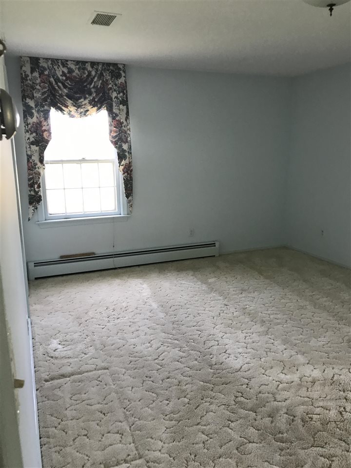1497 Tinkling Spring Road Staunton, VA 24401 - Photo 23 of 31 an empty room with a window