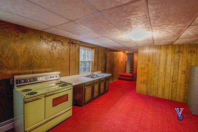 1497 Tinkling Spring Road Staunton, VA 24401 - Photo 26 of 31 a kitchen that has a stove and a wooden floor