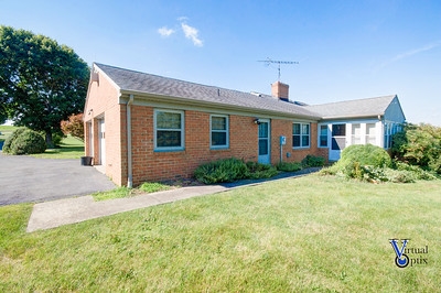 1497 Tinkling Spring Road Staunton, VA 24401 - Photo 6 of 31 a front view of a house with a yard
