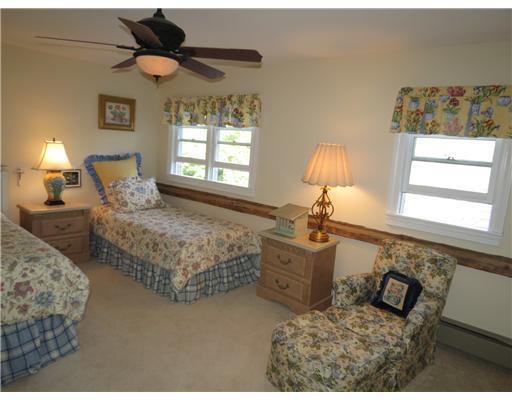 23 Old Winthrop Road Wayne, ME 04284 - Photo 14 of 25 Bedroom. One of the upstairs bedrooms.