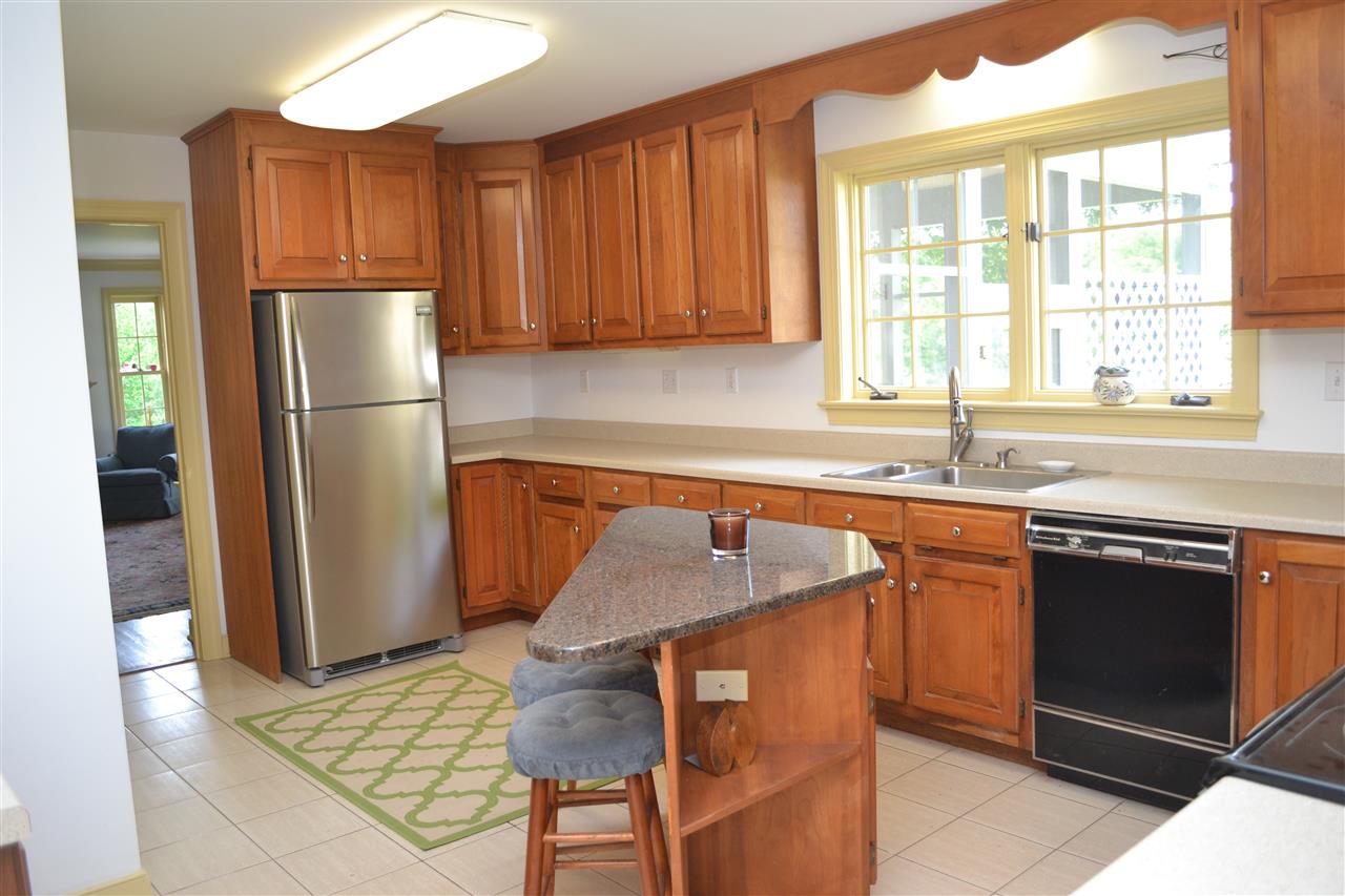 200 Thurman Road Troy, VA 22974 - Photo 13 of 33 with plenty of space for food preparation, storage and entertaining! Tiled 3/4 bath off kitchen.