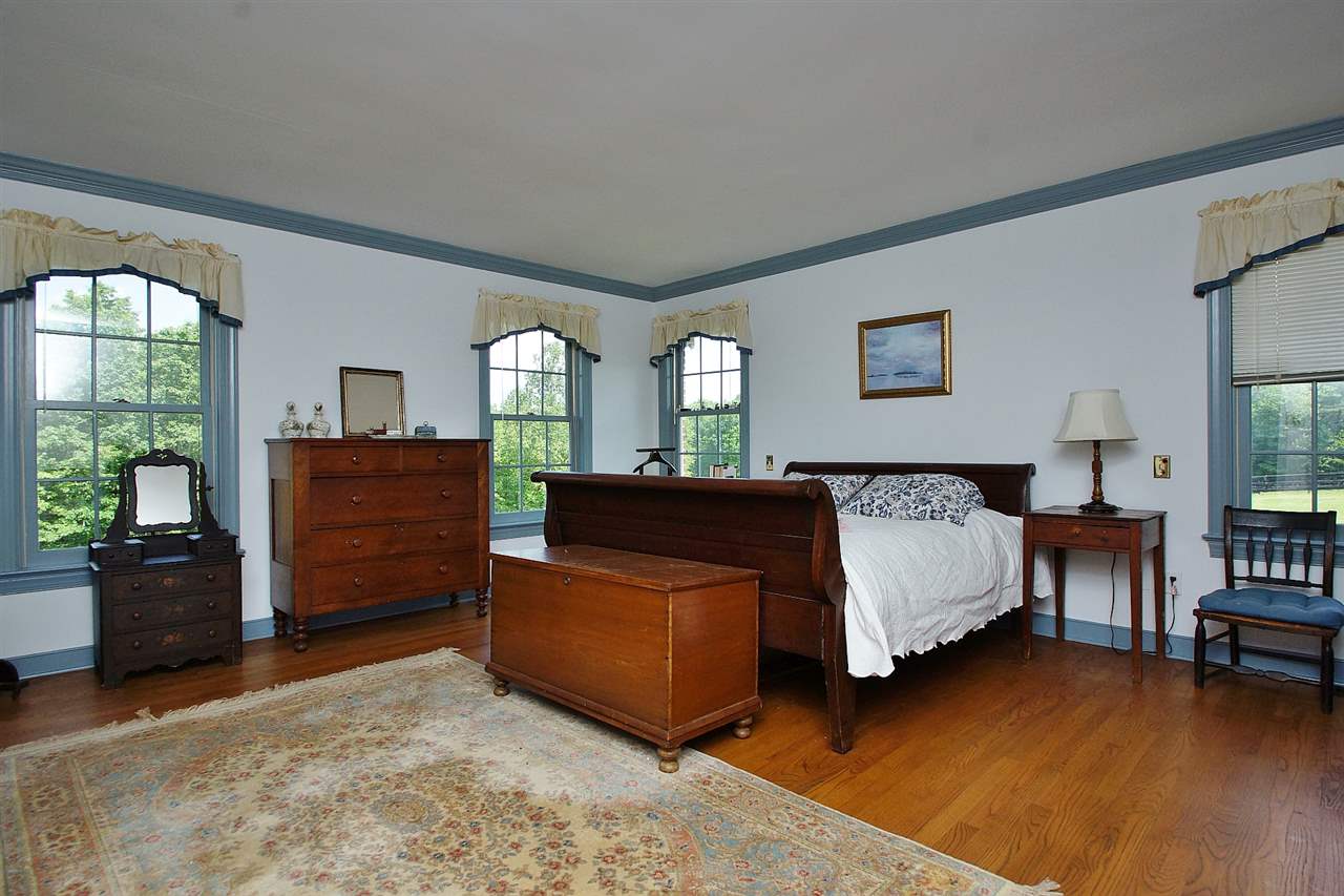 200 Thurman Road Troy, VA 22974 - Photo 16 of 33 on first floor with two walk-in closets and hardwood floors which you will find throughout this level. Attached master bath with tiled floor.