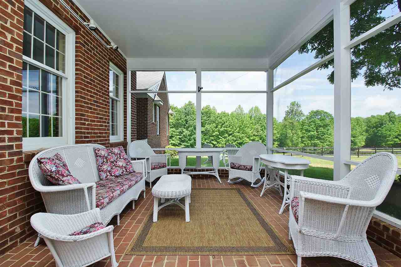 200 Thurman Road Troy, VA 22974 - Photo 5 of 33 overlooking your pasture, paddock and garden space. Brick floor, 10' ceiling and fan. Relax and enjoy any time of day!