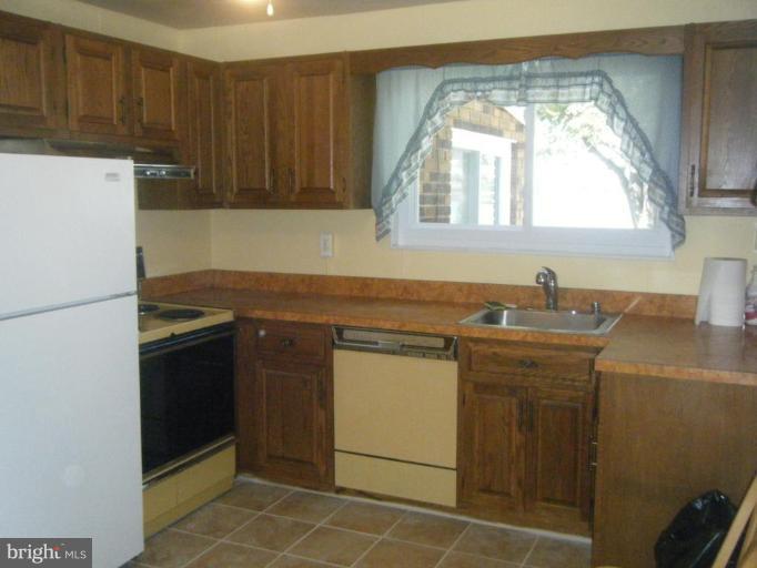 8426 Bay Road Pasadena, MD 21122 - Photo 6 of 16 Kitchen with new ceramic tile