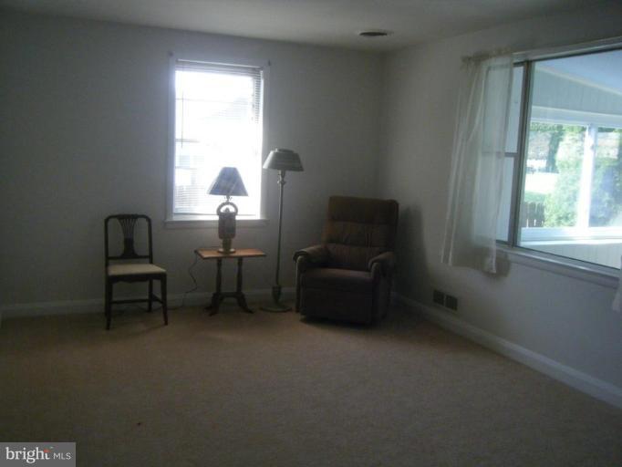 8426 Bay Road Pasadena, MD 21122 - Photo 7 of 16 Living room with waterviews