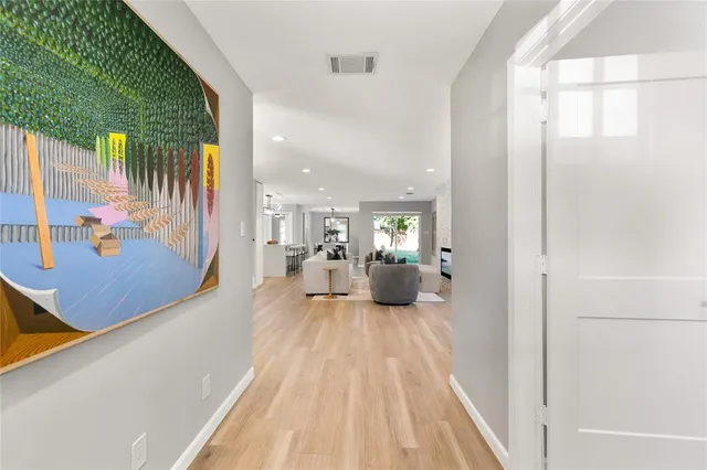 a bathroom with a sink a mirror and vanity