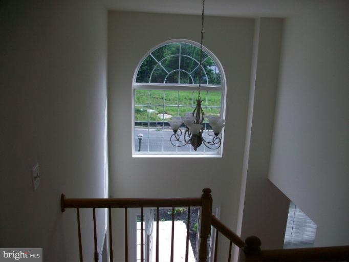 8705 Francesca Drive Clinton, MD 20735 - Photo 19 of 25 a view of wooden floor and a window