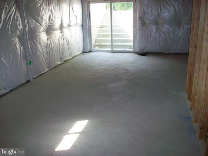 8705 Francesca Drive Clinton, MD 20735 - Photo 20 of 25 a view of empty room with windows