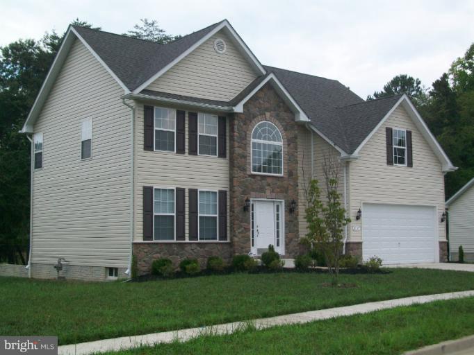 8705 Francesca Drive Clinton, MD 20735 - Photo 25 of 25 a front view of a house with a yard