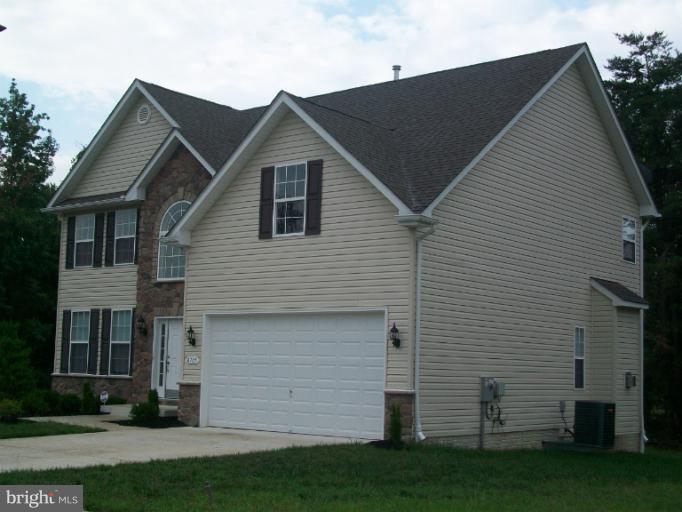 8705 Francesca Drive Clinton, MD 20735 - Photo 5 of 25 a view of a house with a yard
