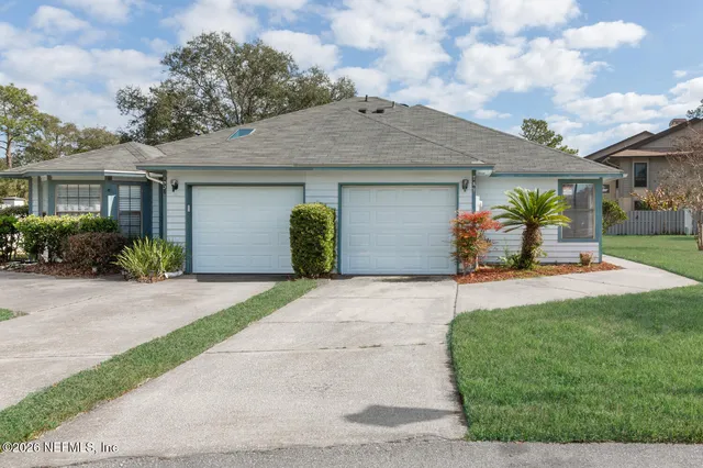 a house view with a garden space
