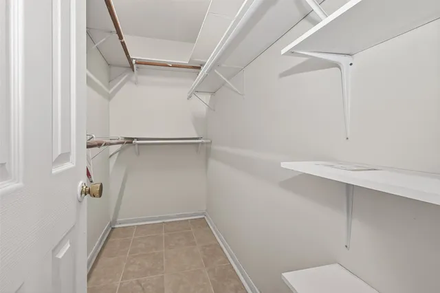 a view of an empty walk in closet