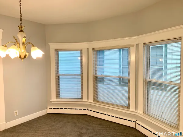 a view of a window in an empty room