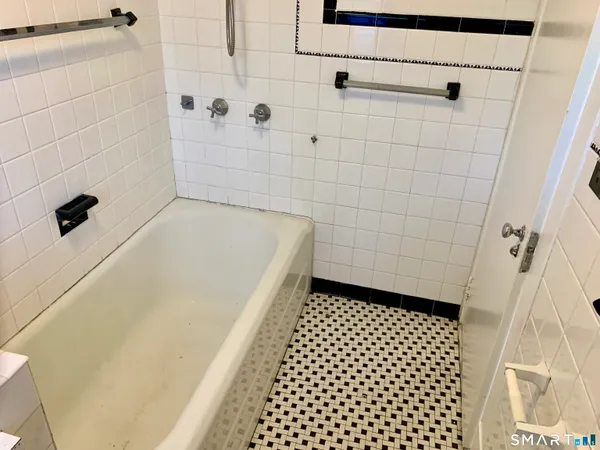 a bathroom with a bathtub