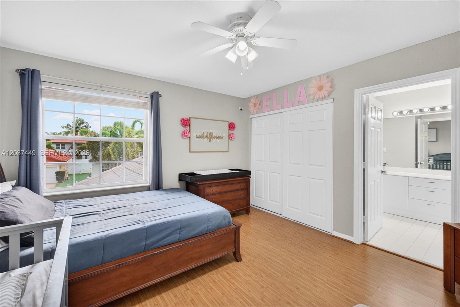 17488 Southwest 28th Court Miramar, FL 33029 - Photo 33 of 50 a bedroom with a bed dresser and a window