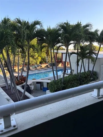 a view of a bathroom with sink and a tub