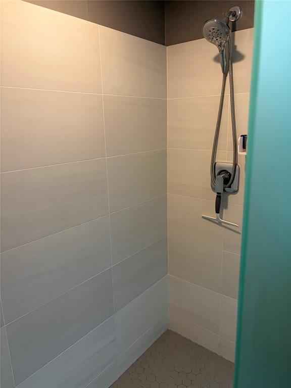 2301 Wilton Drive, Unit R309 Wilton Manors, FL 33305 - Photo 17 of 26 a bathroom with a shower