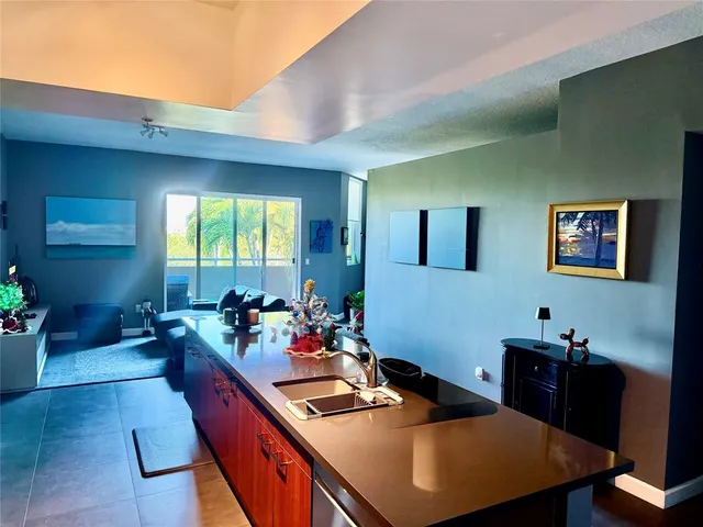 a room with furniture and a large window