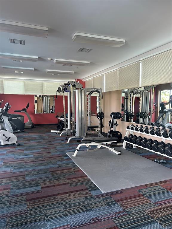 2301 Wilton Drive, Unit R309 Wilton Manors, FL 33305 - Photo 21 of 26 a view of a room with gym equipment