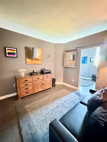 a bedroom with furniture and a bed