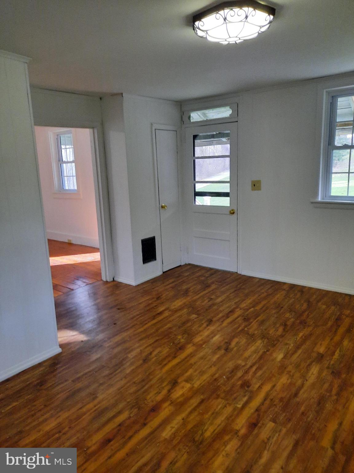 1515 River Road Drumore, PA 17518 - Photo 6 of 13 a view of empty room with wooden floor and fan