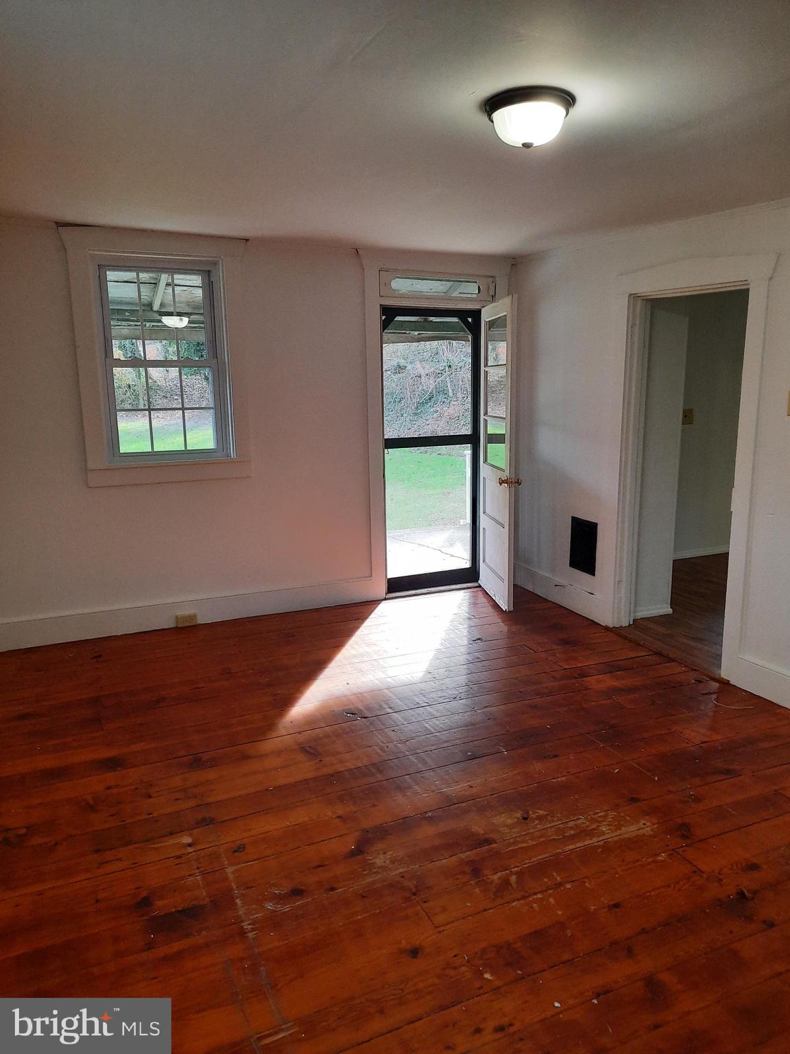 1515 River Road Drumore, PA 17518 - Photo 7 of 13 a view of livingroom with hardwood floor and window