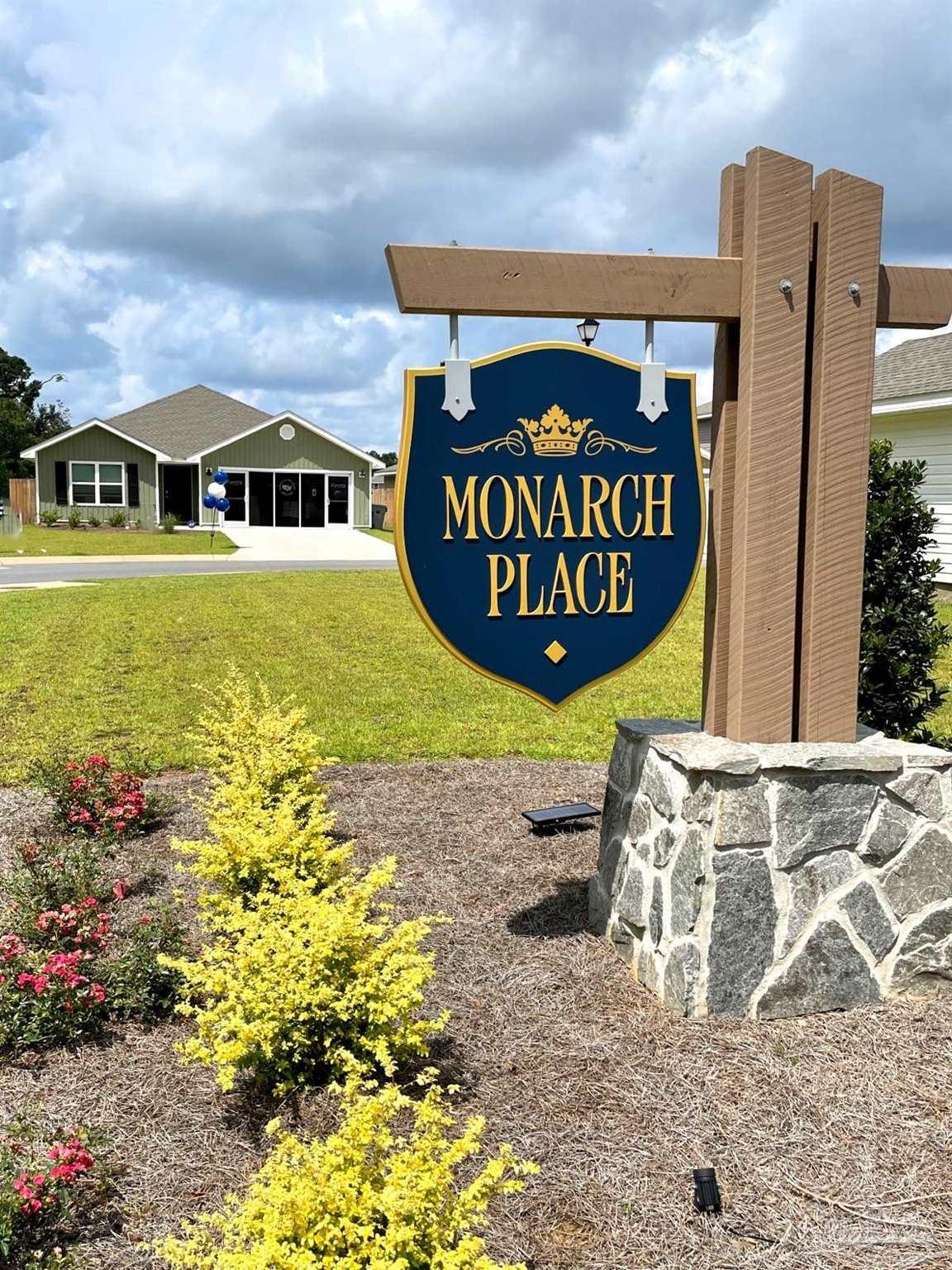 265 Monarch Lane Pensacola, FL 32503 - Photo 2 of 13 a front view of a house with garden