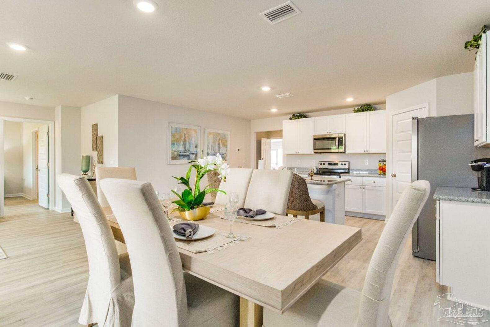 265 Monarch Lane Pensacola, FL 32503 - Photo 6 of 13 a view of a dining room with furniture