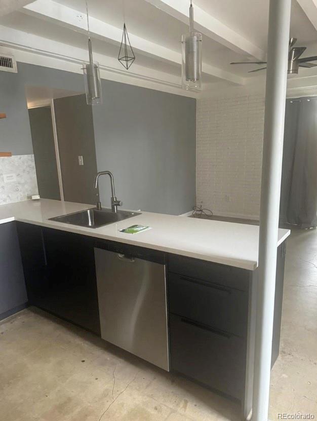 1040 Stuart Street Denver, CO 80204 - Photo 1 of 9 a bathroom with a sink and a mirror