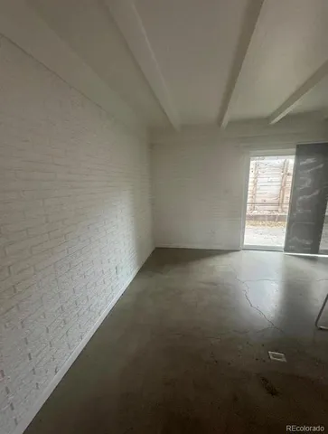 a view of a room that has countertops with windows