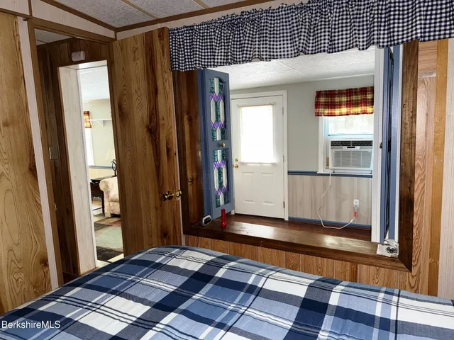 a view of a roof deck with wooden fence