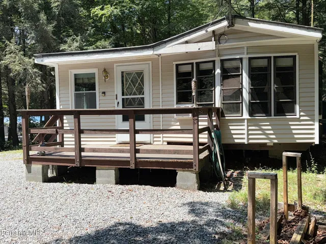 a view of house with outdoor space