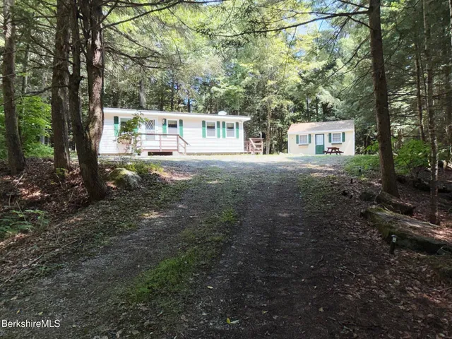 a view of a park with welcome board