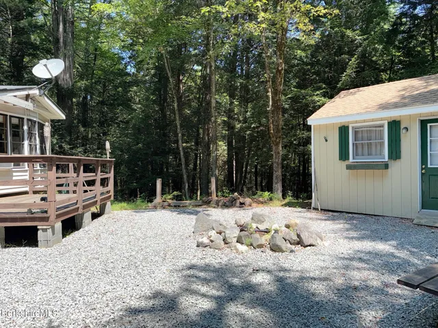 a view of a lounge chairs in the patio