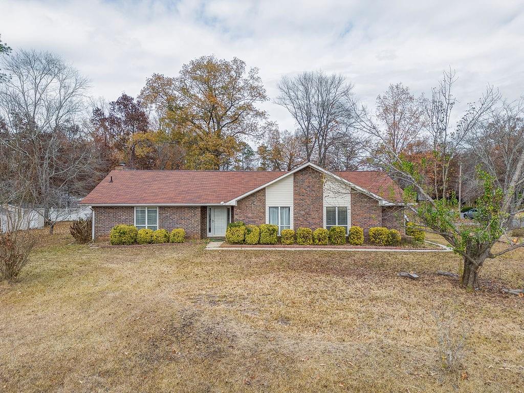 101 Treeside Drive Rome, GA 30165 - Photo 1 of 1 front view of a house with a yard