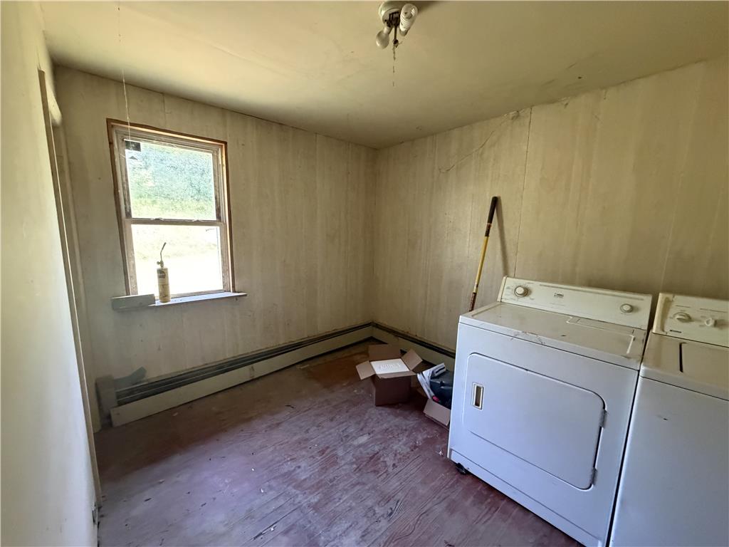 5114 Three Lakes Road New Milford, PA 18834 - Photo 34 of 55 A dedicated laundry space awaits your personal touch and creative renovation ideas.