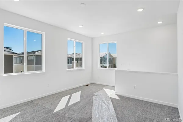 an empty room with windows