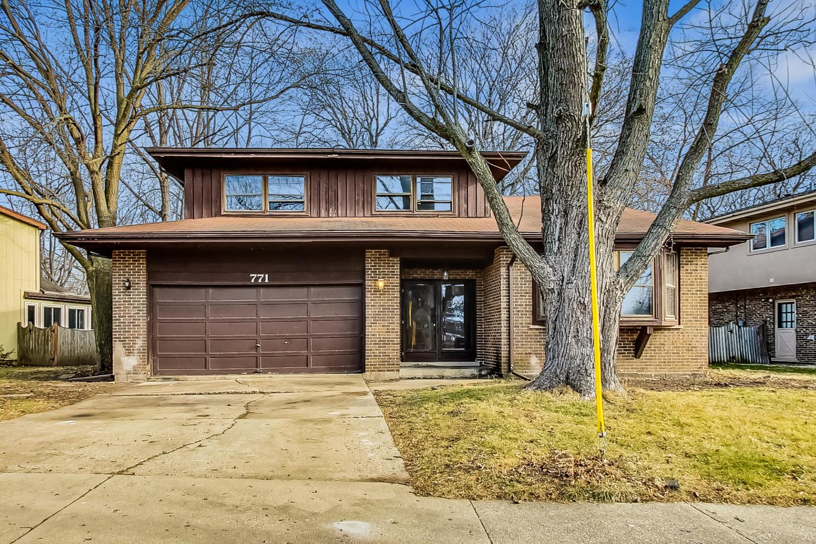 771 Ridge Road Highland Park, IL 60035 - Photo 1 of 54 a house with a outdoor space