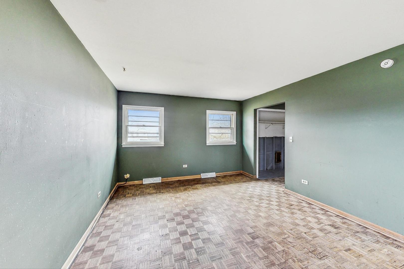 771 Ridge Road Highland Park, IL 60035 - Photo 25 of 54 a view of wooden floor and windows in a room