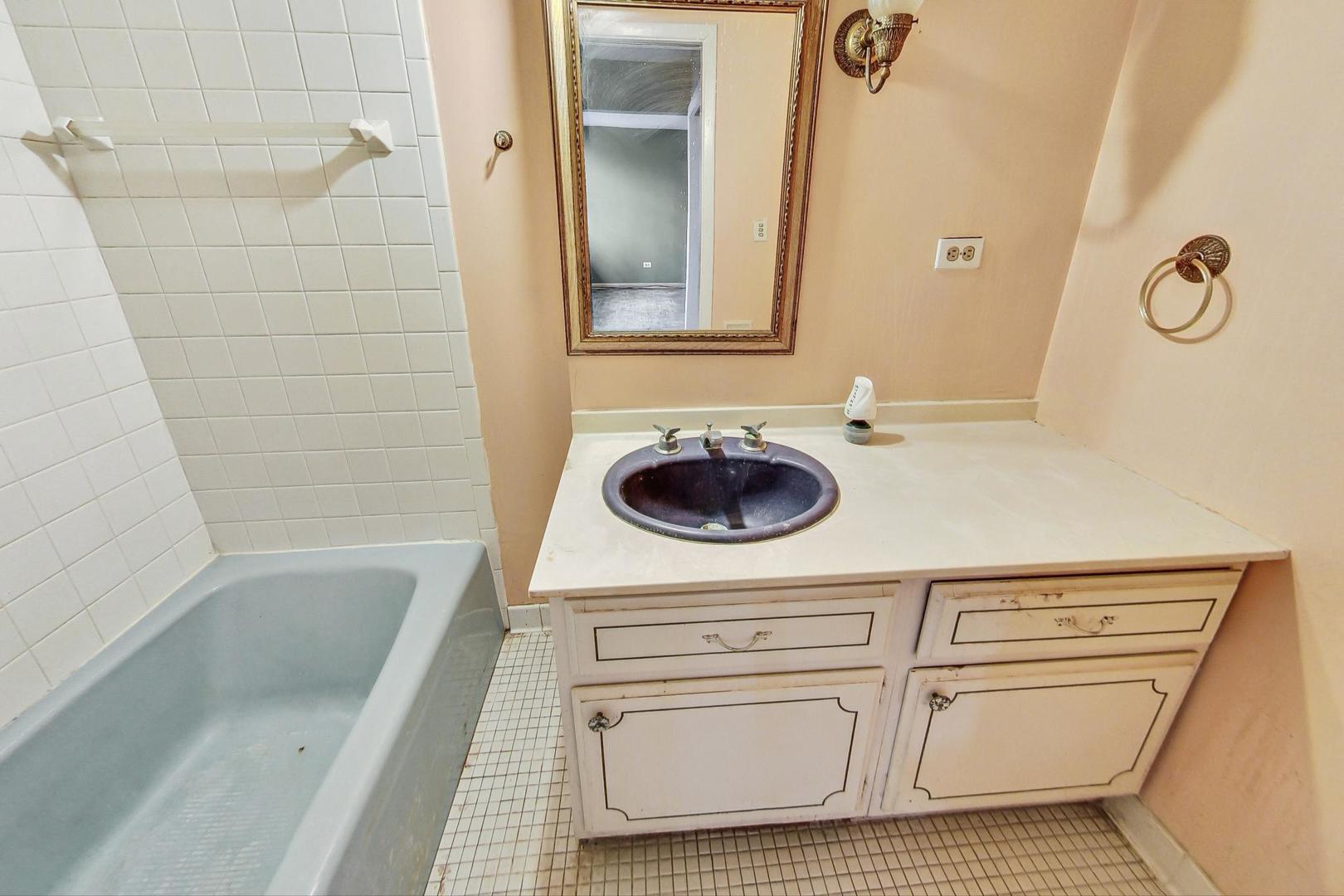 771 Ridge Road Highland Park, IL 60035 - Photo 29 of 54 a bathroom with a sink a toilet and shower