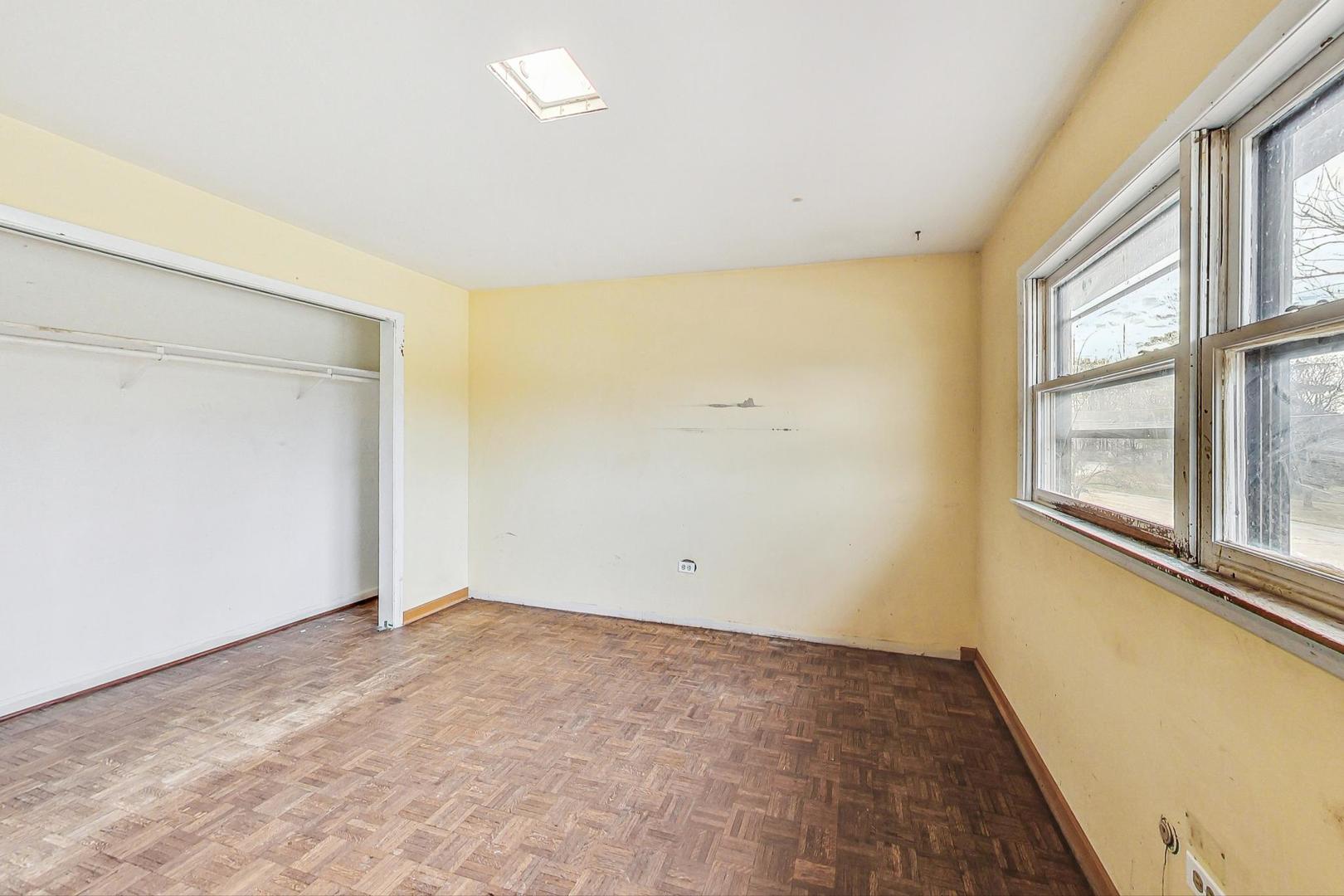 771 Ridge Road Highland Park, IL 60035 - Photo 32 of 54 a view of an empty room with a window