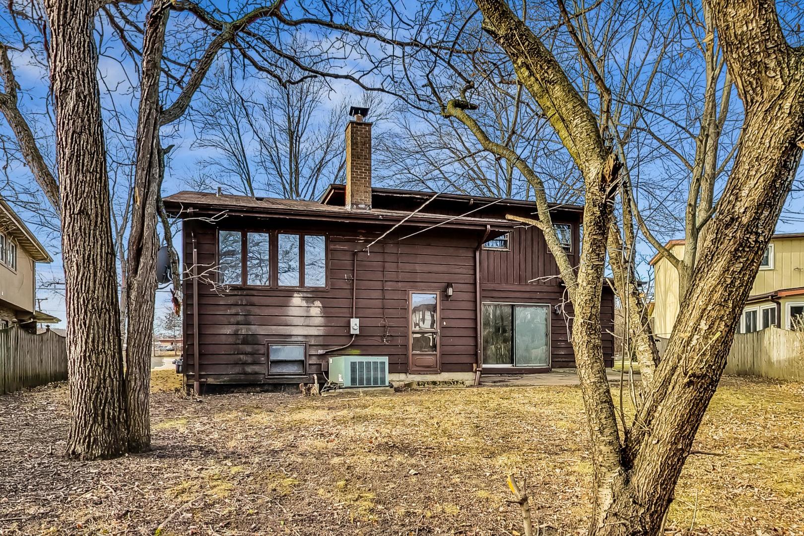 771 Ridge Road Highland Park, IL 60035 - Photo 46 of 54 a front view of a house with a yard