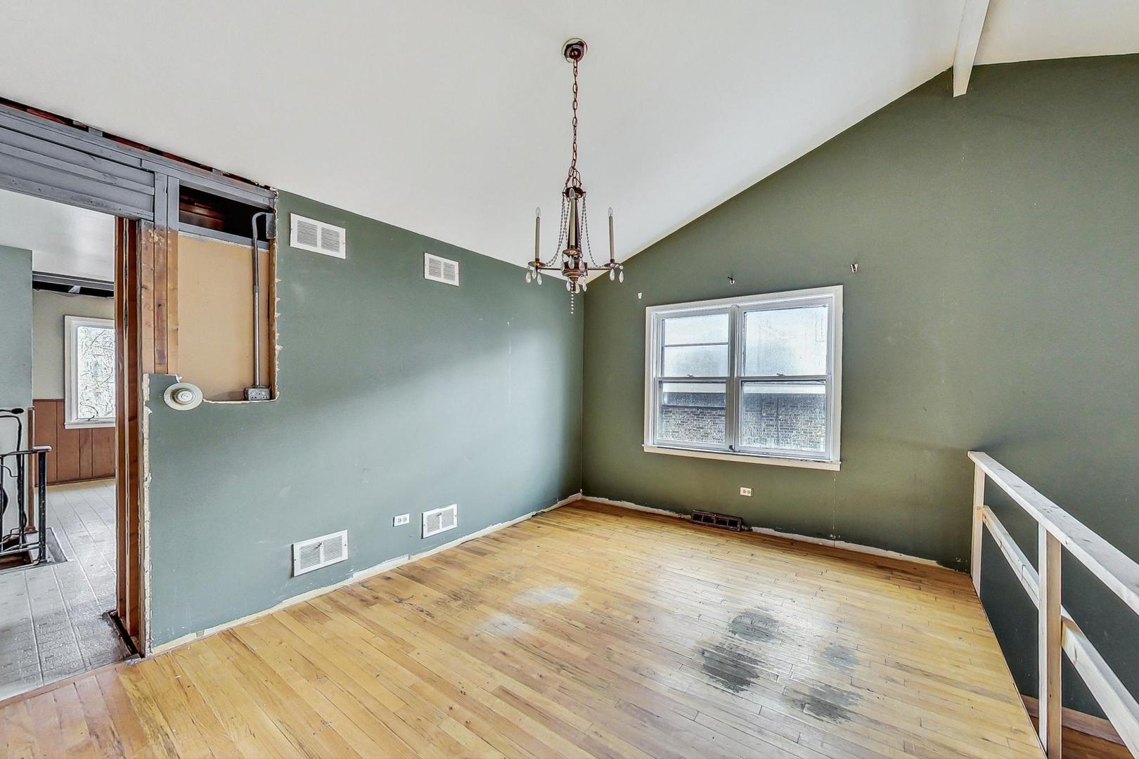771 Ridge Road Highland Park, IL 60035 - Photo 10 of 54 a view of a room with a window and wooden floor