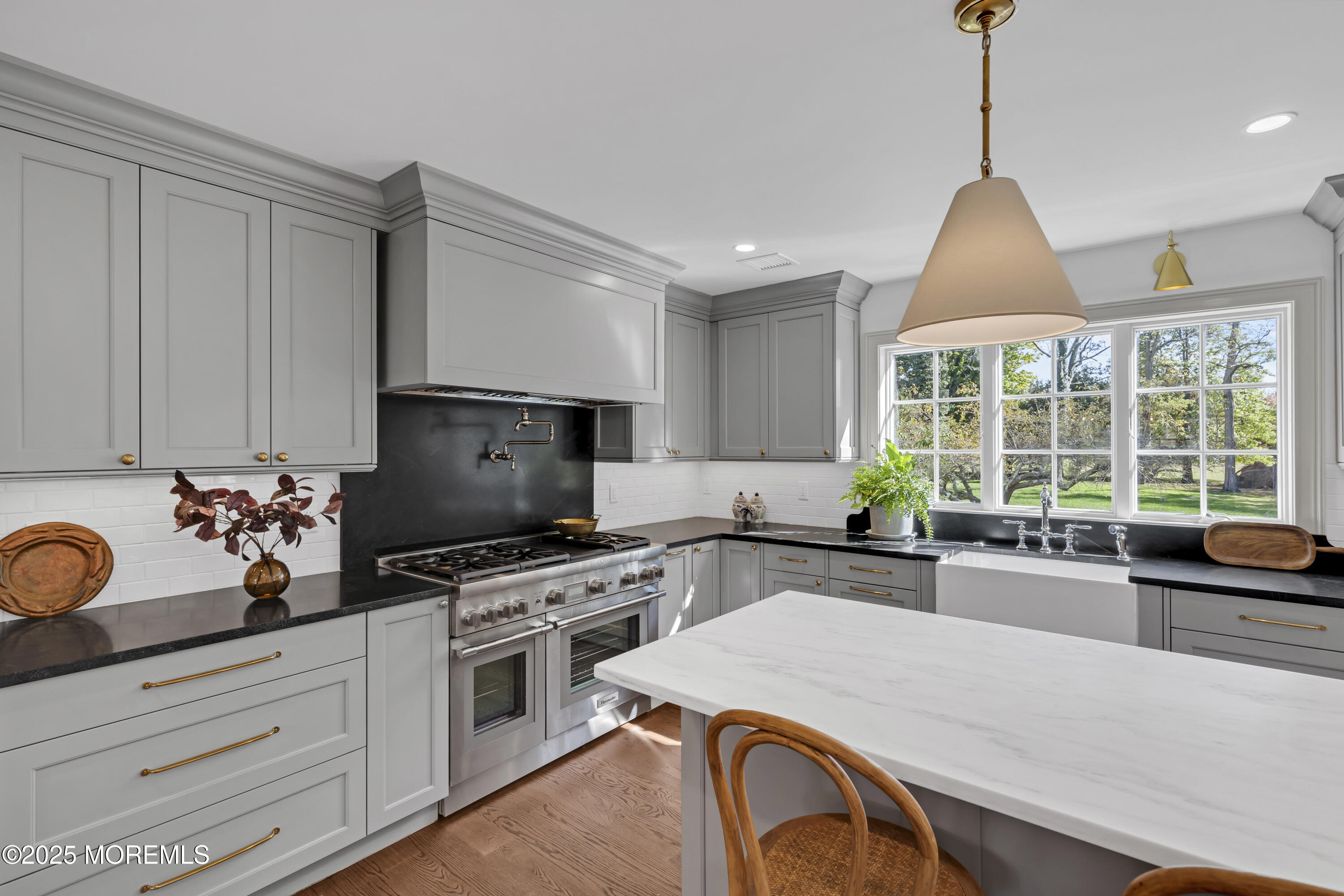 420 Rumson Road Little Silver, NJ 07739 - Photo 15 of 51 a kitchen with a stove a sink and a refrigerator