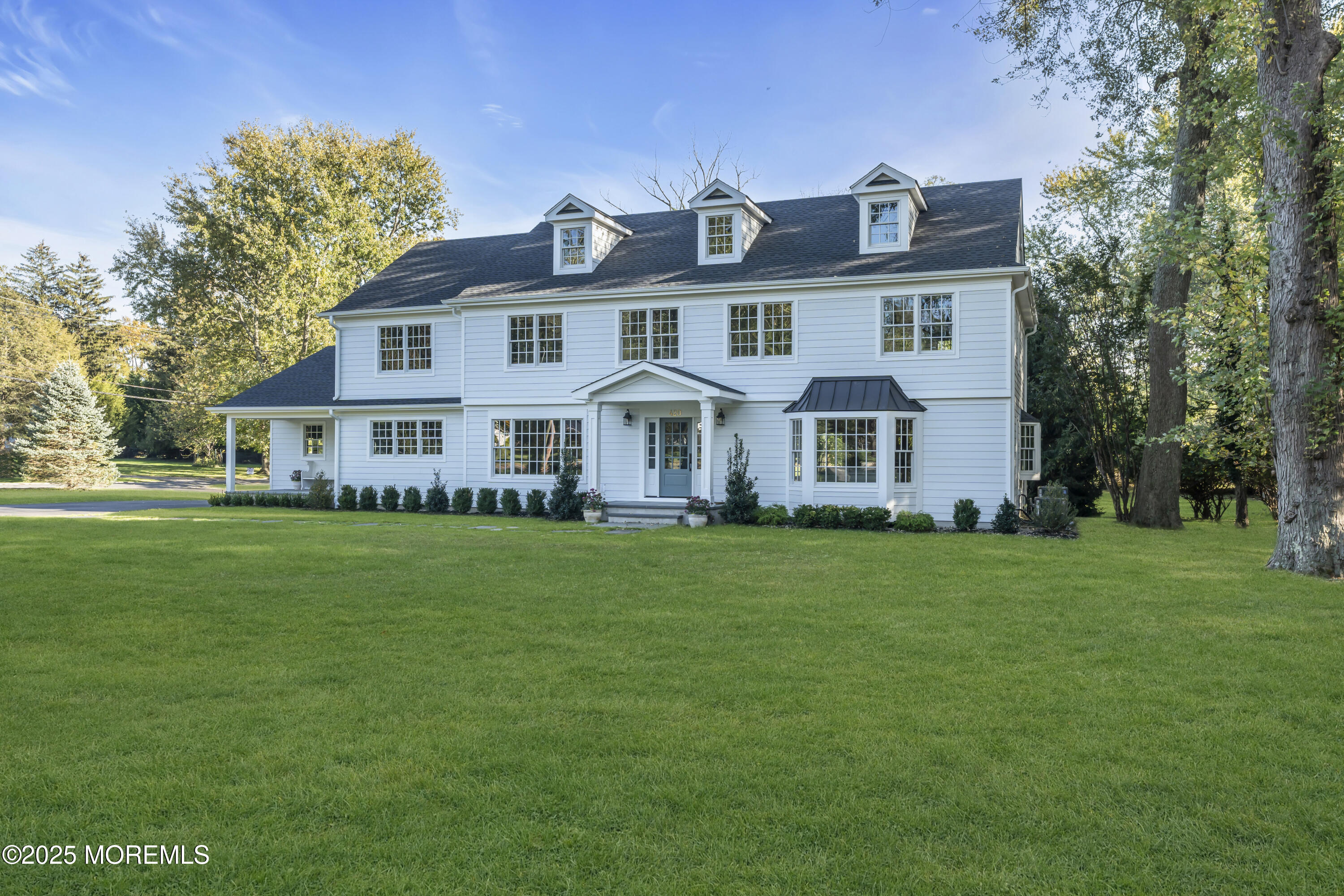 420 Rumson Road Little Silver, NJ 07739 - Photo 33 of 51 a view of a yard in front of a house with large trees