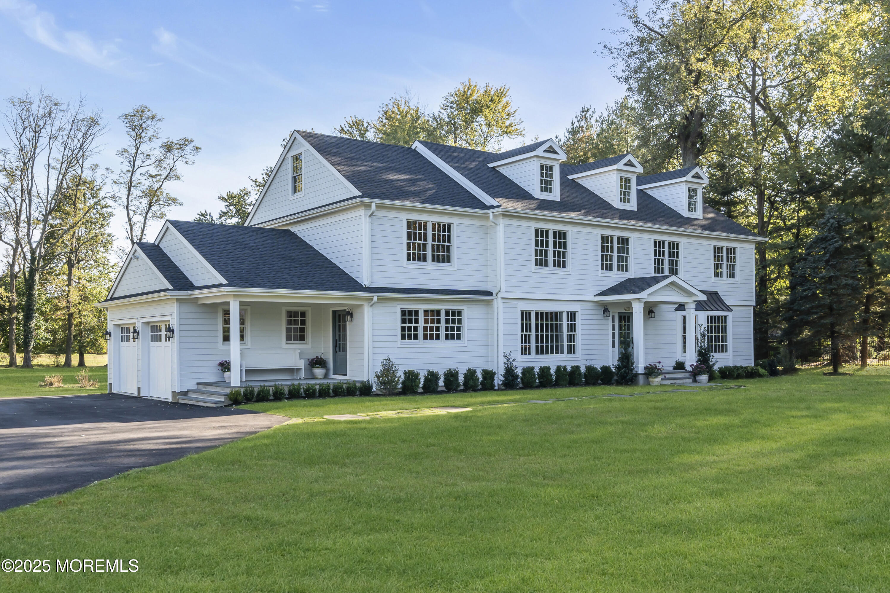 420 Rumson Road Little Silver, NJ 07739 - Photo 41 of 51 a front view of a house with a garden