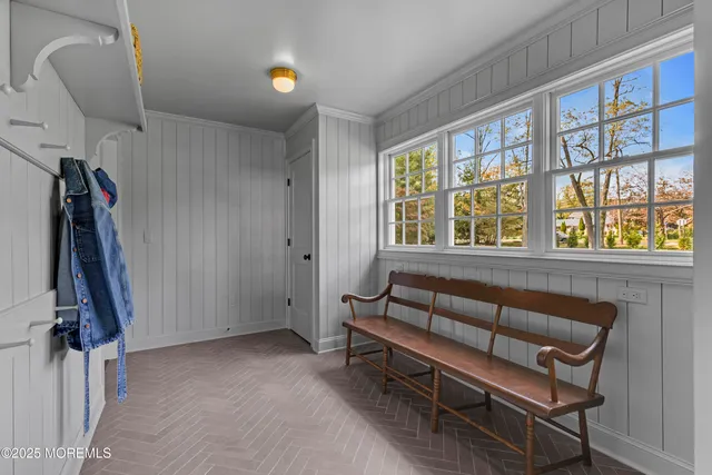 a kitchen with a table and chairs