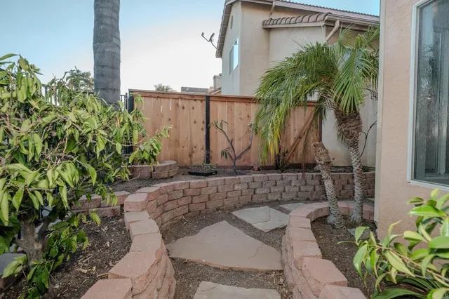 a view of balcony with a potted plant